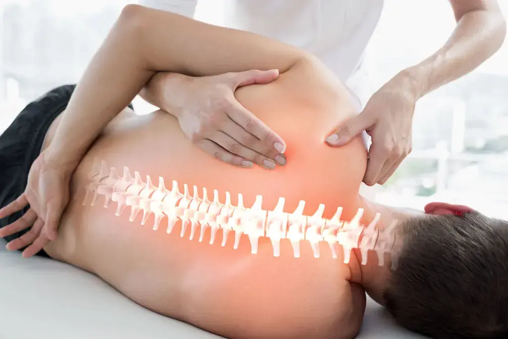 Registered osteopath treating a patient at Archway Wellness Centre
